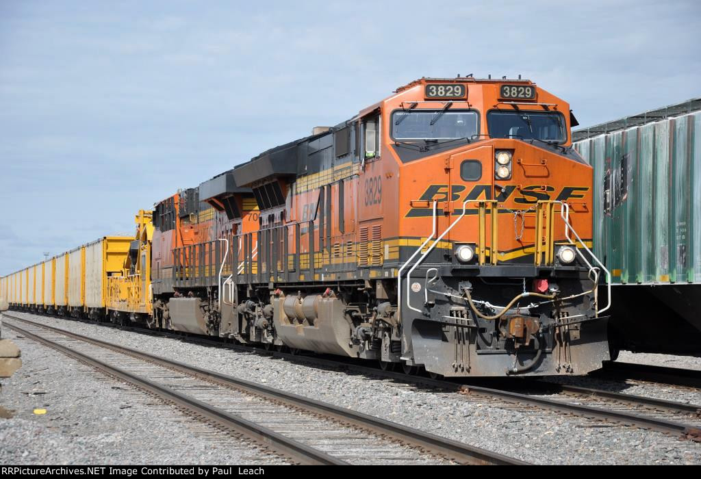 Ballast train rolls east in the yard